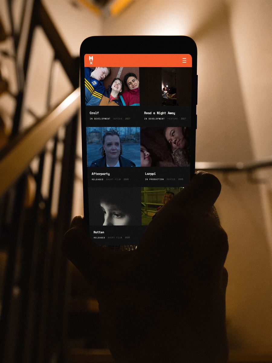 Wildhog Productions website on a phone, showing the productions grid